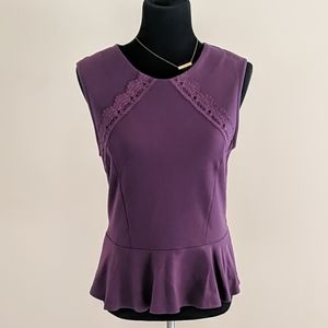Purple sleeveless peplum top